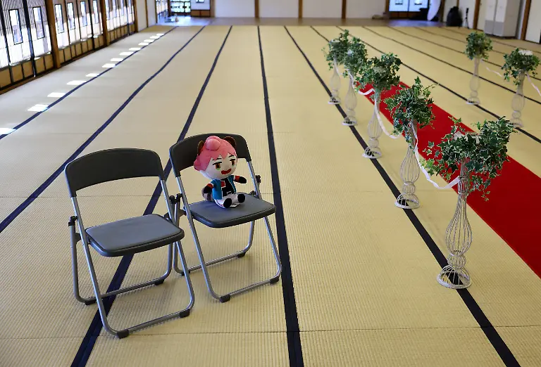A-doll-sits-on-a-chair-during-a-wedding-ceremony-between-a-33-year-old-Australian-woman-and-Japanese-manga-character-Mephisto-Pheles-at-traditional-guest-house-Rinkokaku-in-Maebashi-Japan-March-14-2025-REUTERS-Kim-Kyung-Hoon-SEARCH-JAPAN-KYUNG-HOON-AI-WEDDING-FOR-THIS-STORY-SEARCH-WIDER-IMAGE-FOR-ALL-STORIES-REFILE-UPDATING-CAPTION-TO-CORRECT-RELATIONSHIP