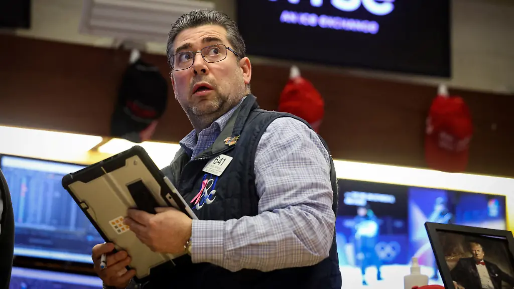 A-trader-works-on-the-floor-at-the-New-York-Stock-Exchange-NYSE-in-New-York-City-U-S-February-5-2026