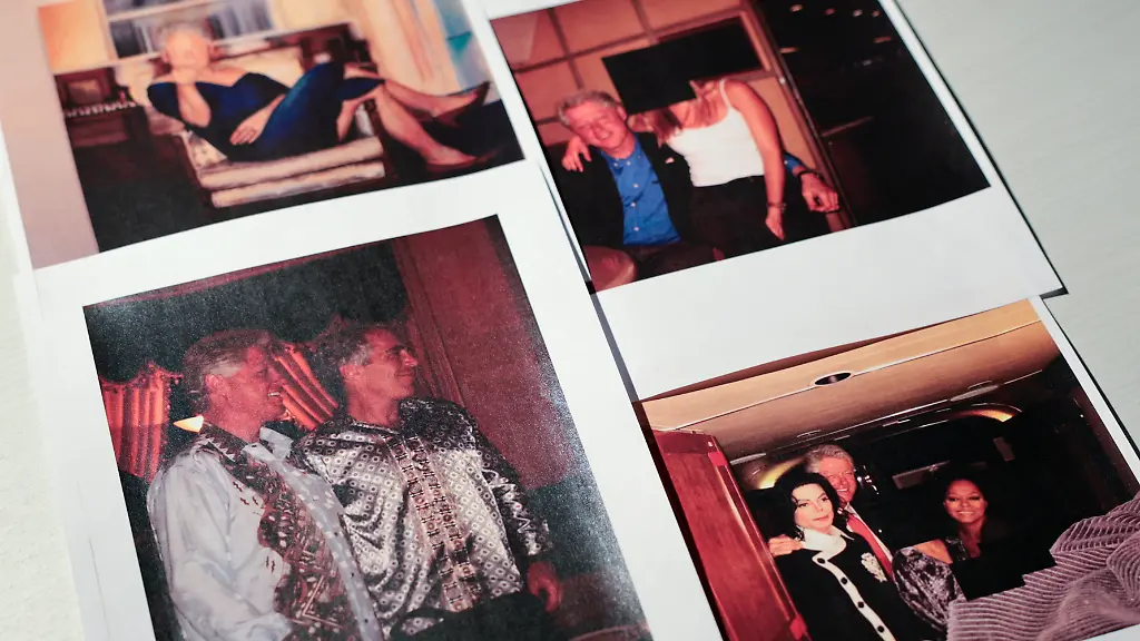 Newly-released-documents-from-disgraced-late-financier-and-sex-offender-Jeffrey-Epstein-including-a-number-of-pictures-of-former-U-S-President-Bill-Clinton-and-a-photo-of-a-painting-depicting-Clinton-in-a-blue-dress-are-seen-in-these-handout-images-released-by-the-U-S-Justice-Department-and-printed-and-arranged-for-a-photograph-by-Reuters-in-Washington-D-C-U-S-December-19-2025