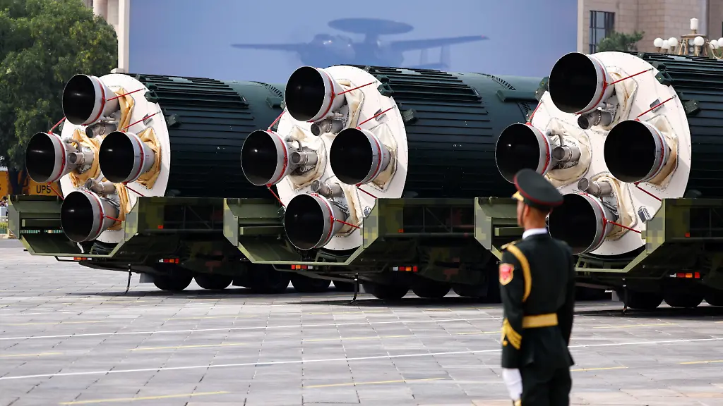 A-member-of-the-People-s-Liberation-Army-stands-as-the-strategic-strike-group-displays-DF-5C-nuclear-missiles-during-a-military-parade-to-mark-the-80th-anniversary-of-the-end-of-World-War-Two-in-Beijing-China-September-3-2025