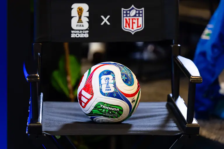 SAN-FRANCISCO-CA-FEBRUARY-04-An-Adidas-FIFA-World-Cup-WM-Weltmeisterschaft-Fussball-soccer-ball-is-seen-on-a-FIFA-x-NFL-American-Football-Herren-USA-chair-in-the-Media-Center-ahead-of-Super-Bowl-LX-on-February-4-2026-at-the-Moscone-Center-in-San-Francisco-CA