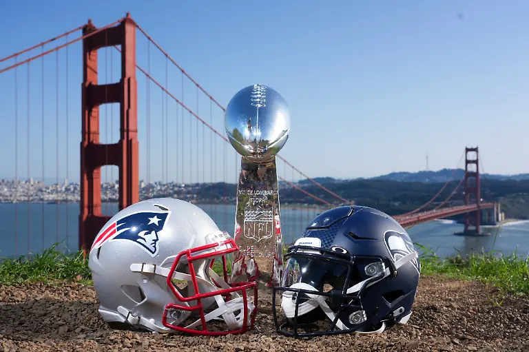Detailed-view-of-the-New-England-Patriots-and-Seattle-Seahawks-helmets-and-an-the-Vince-Lombardi-trophy-at-the-Golden-Gate-Bridge-ahead-of-Super-Bowl-LX-on-Jan-29-2026-in-San-Francisco-Ca