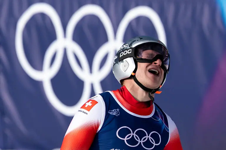 Switzerland-s-Marco-Odermatt-reacts-in-the-finish-area-during-the-men-s-alpine-skiing-downhill-race-at-the-2026-Olympic-Winter-Games-at-the-Stelvio-Ski-centre-in-Bormio-Italy-on-Saturday-February-7-2026