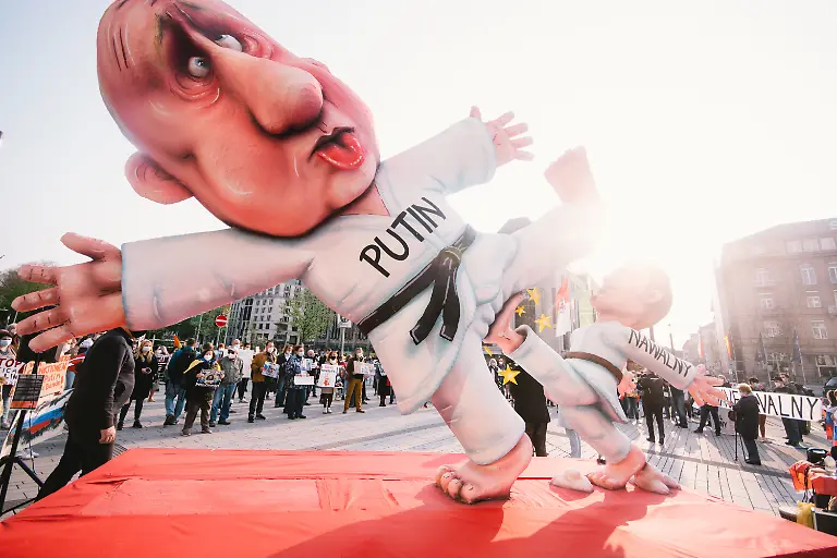 Jacques-Tilly-carnival-float-is-seen-during-the-protest-supporting-Russian-opposition-politician-Alexei-Navalny-and-demand-his-release-from-prison-in-Duesseldorf-Germany-on-April-21-2021-Photo-by-Ying-Tang-NurPhoto