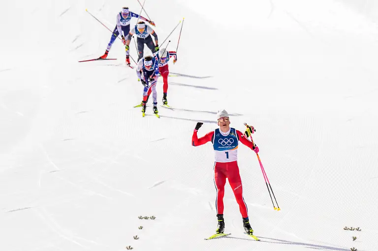 Winter-Olympics-in-Milan-Cortina-2026-Val-di-Fiemme-Italy-20260208-Johannes-Hoesflot-Klaebo-of-Norway-celebrates-during-the-men-s-cross-country-20-km-Skiathlon-at-Lago-di-Tesero-during-the-Winter-Olympics-in-Milano-Cortina-2026-Photo-Terje-Pedersen-NTB-Val-di-Fiemme-Italy-EDITORIAL-USE-ONLY-RESTRICTED-USE-FOR-BETTING-COMPANIES-Ref-SPOvN1vMEJQirs