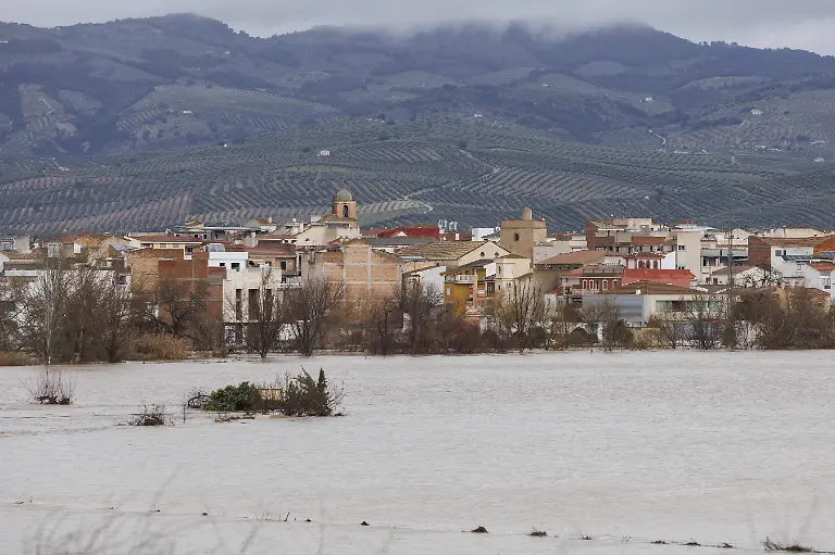 Spain-s-Andalusia-on-red-alert-due-to-Storm-Leonardo-GRANADA-SPAIN-FEBRUARY-5-The-Genil-River-overflows-its-banks-as-it-passes-through-Huetor-Tajar-where-the-Emergency-Military-Unit-UME-is-helping-to-remove-water-during-the-red-alert-in-Andalusia-due-to-heavy-rains-on-February-05-2026-in-Granada-Spain-Alex-Camara-Anadolu-Granada-Spain-Editorial-use-only-Please-get-in-touch-for-any-other-usage