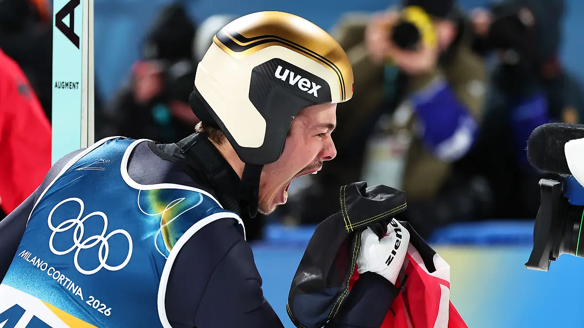 Olympia-Olympische-Winterspiele-Mailand-Cortina-2026-Ski-nordisch-Skispringen-Normalschanze-Maenner-Durchgang-2-Philipp-Raimund-Deutschland-jubelt-ueber-seinen-Sieg