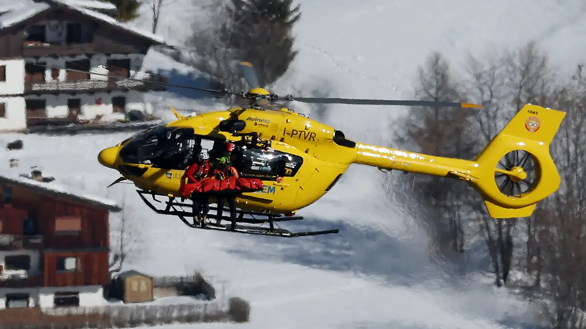 CORTINA-D-AMPEZZO-ITALY-FEBRUARY-08-A-mountain-rescue-helicopter-is-seen-rescuing-Lindsey-Vonn-of-Team-United-States-after-she-crashed-during-the-Women-s-Downhill-on-day-two-of-the-Milano-Cortina-2026-Winter-Olympics-at-Tofane-Alpine-Skiing-Centre-on-February-08-2026-in-Cortina-d-Ampezzo-Italy