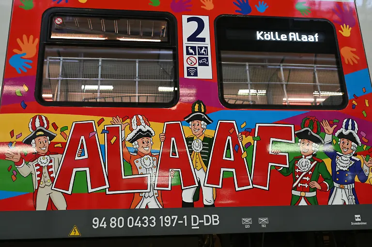 Das-Festkomitee-Koelner-Karneval-und-DB-Regio-NRW-praesentieren-zum-11-Mal-die-mit-Wimmelbildern-karnevalistisch-gestaltete-S-Bahn-fuer-die-diesjaehrige-Session-in-Beisein-des-Koelner-Karneval-Dreigestirn-der-Session-2026