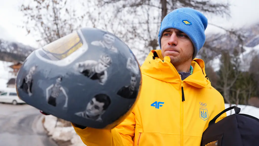Milano-Cortina-2026-Winter-Olympics-Day-Six-Ukraine-s-Vladyslav-Heraskevych-with-his-helmet-which-features-pictures-of-people-killed-in-the-war-with-Russia-Heraskevych-was-ruled-out-of-the-Men-s-Skeleton-event-by-the-International-Olympic-Committee-just-over-an-hour-before-competition-began-pictured-at-the-Cortina-Sliding-Centre-on-day-six-of-the-Milano-Cortina-2026-Winter-Olympics-Italy-Picture-date-Thursday-February-12-2026-Photo-credit-should-read-Andrew-Milligan-PA-Wire-RESTRICTIONS-Use-subject-to-restrictions-Editorial-use-only-no-commercial-use-without-prior-consent-from-rights-holder