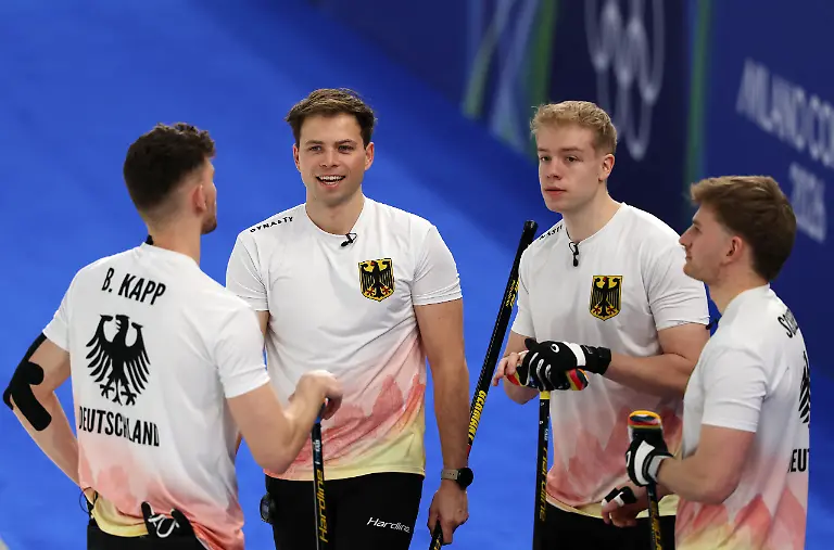 Milano-Cortina-2026-Olympics-Curling-Men-s-Round-Robin-Session-2-Norway-vs-Germany-Cortina-Curling-Olympic-Stadium-Cortina-d-Ampezzo-Italy-February-12-2026-Marc-Muskatewitz-of-Germany-Benjamin-Kapp-of-Germany-Felix-Messenzehl-of-Germany-and-Johannes-Scheuerl-of-Germany-react-during-their-match-against-Norway-in-Men-s-Round-Robin-Session-2