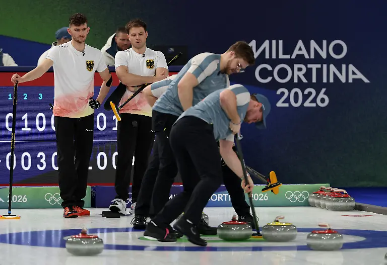 Milano-Cortina-2026-Olympics-Curling-Men-s-Round-Robin-Session-2-Norway-vs-Germany-Cortina-Curling-Olympic-Stadium-Cortina-d-Ampezzo-Italy-February-12-2026-Martin-Sesaker-of-Norway-and-Bendik-Ramsfjell-of-Norway-in-action-during-their-match-against-Germany-in-Men-s-Round-Robin-Session-2