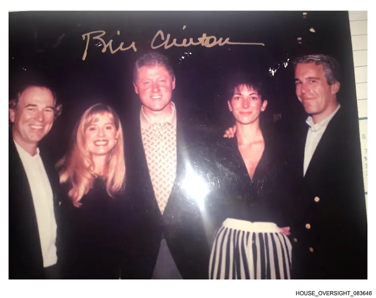 Former-U-S-President-Bill-Clinton-Ghislaine-Maxwell-and-late-financier-and-convicted-sex-offender-Jeffrey-Epstein-pose-in-this-handout-image-released-from-Epstein-s-estate-by-Democrats-on-the-House-Oversight-Committee-in-Washington-D-C-U-S-on-December-12-2025-House-Oversight-Committee-Democrats-Handout-via-REUTERS
