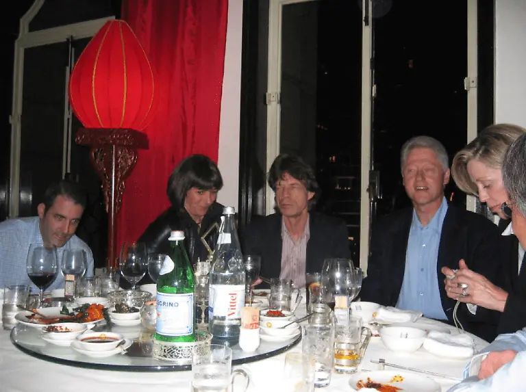 Former-U-S-President-Bill-Clinton-Mick-Jagger-and-Ghislaine-Maxwell-are-seen-in-this-image-released-by-the-Department-of-Justice-in-Washington-D-C-U-S-on-December-19-2025-as-part-of-a-new-trove-of-documents-from-its-investigations-into-the-late-financier-and-convicted-sex-offender-Jeffrey-Epstein-U-S