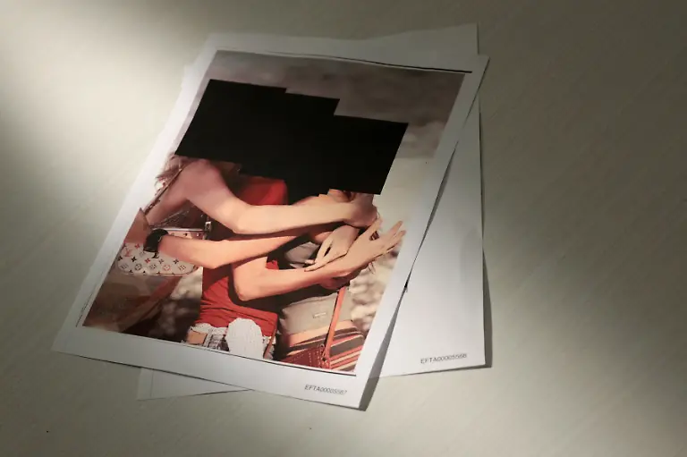 Newly-released-documents-from-disgraced-late-financier-and-sex-offender-Jeffrey-Epstein-here-including-redacted-photos-of-women-are-seen-in-this-handout-image-released-by-the-U-S-Justice-Department-and-printed-and-arranged-for-a-photograph-by-Reuters-in-Washington-D-C-U-S-December-19-2025