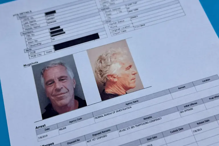 Documents-that-were-included-in-the-U-S-Department-of-Justice-release-of-the-Jeffrey-Epstein-files-are-photographed-Friday-Jan-2-2026