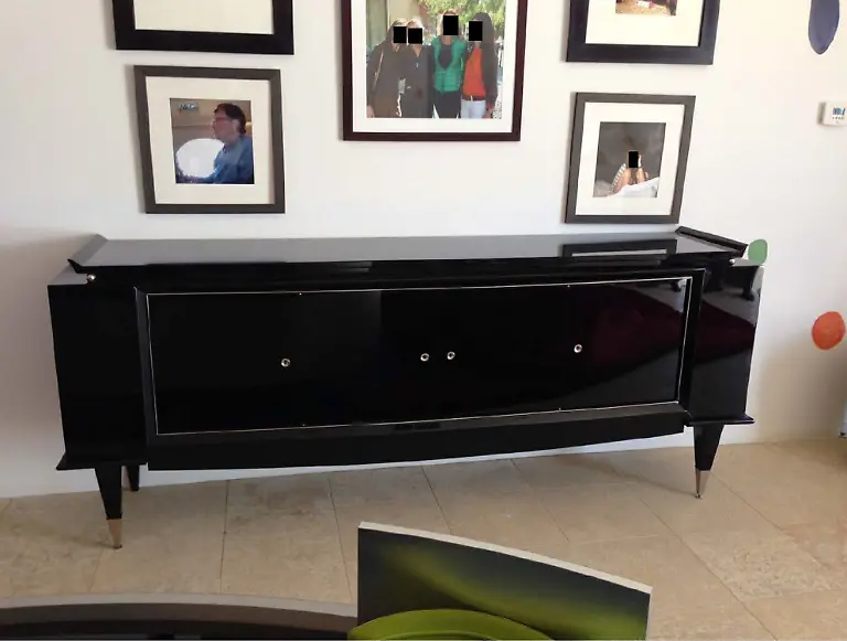 December-12-2025-Washington-District-of-Columbia-USA-A-framed-photograph-of-Bill-Gates-left-hangs-on-a-wall-Also-on-the-wall-are-framed-photographs-of-unidentified-people-whose-faces-were-redacted-by-Democrats-on-the-House-Oversight-Committee-Democrats-on-the-House-Oversight-Committee-on-Friday-released-a-second-batch-of-images-from-the-late-convicted-sex-offender-Epstein-s-estate