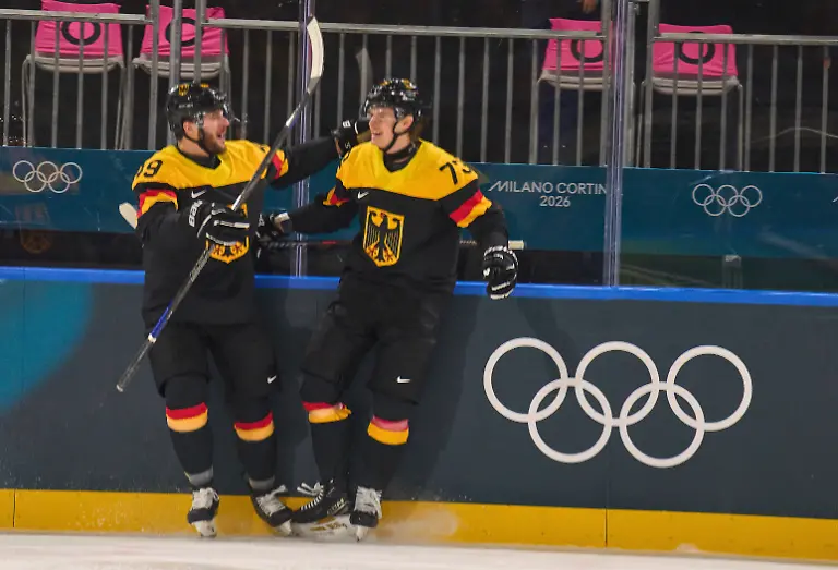 Lukas-Reichel-of-Germany-scores-for-1-0-at-the-preliminary-men-Ice-hockey-Eishockey-match-Group-C-Germany-Latvia-of-the-Milano-Cortina-2026-Winter-Olympic-Games-Olympische-Spiele-Olympia-OS-at-Milano-Rho-Ice-Hockey-Arena-on-February-14-2026-in-Milan-Italy