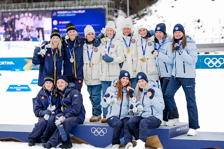 OLYMPICS-Winter-Olympic-Games-Olympische-Spiele-Olympia-OS-Milano-Cortina-2026-TESERO-ITALY-14-FEB-26-OLYMPICS-NORDIC-SKIING-CROSS-COUNTRY-SKIING-Winter-Olympic-Games-Milano-Cortina-2026-4X7-5km-relay-women-medal-ceremony-Image-shows-Linn-Svahn-Ebba-Andersson-Frida-Karlsson-Jonna-Sundling-SWE-Kristin-Austgulen-Fosnaes-Astrid-Oeyre-Slind-Karoline-Simpson-Larsen-and-Heidi-Weng-NOR-and-Johanna-Matintalo-Kerttu-Niskanen-Vilma-Ryytty-and-Jasmi-Joensuu-FIN