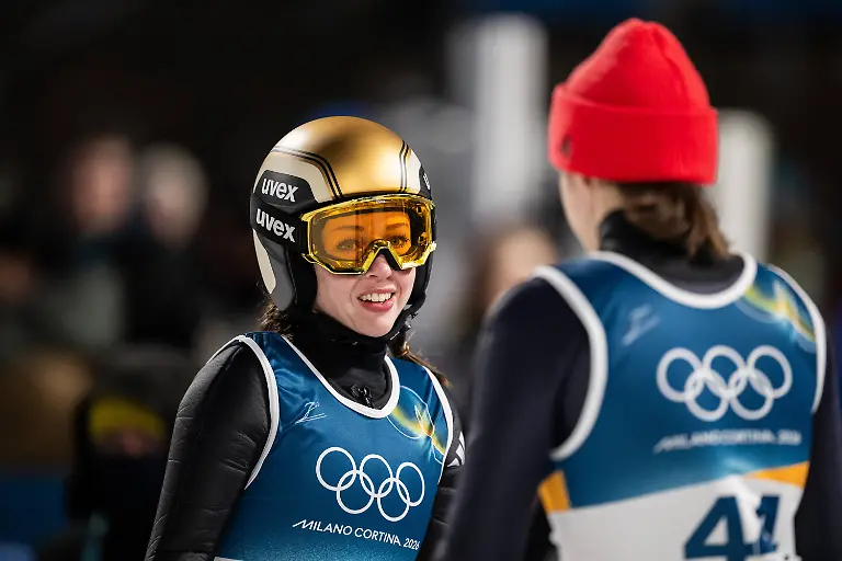 260215-Juliane-Seyfarth-of-Germany-after-competing-in-the-womens-large-hill-individual-Ski-jumping-Skispringen-Ski-nordisch-during-day-9-of-the-2026-Winter-Olympics-on-February-15-2026-in-Predazzo