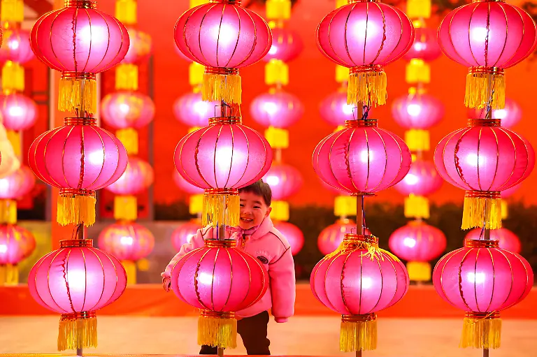 260215-BEIJING-Feb-15-2026-Xinhua-A-child-plays-at-a-square-in-Jingning-County-northwest-China-s-Gansu-Province-Feb-13-2026-China-is-alive-with-vibrant-celebrations-with-the-Spring-Festival-just-around-the-corner