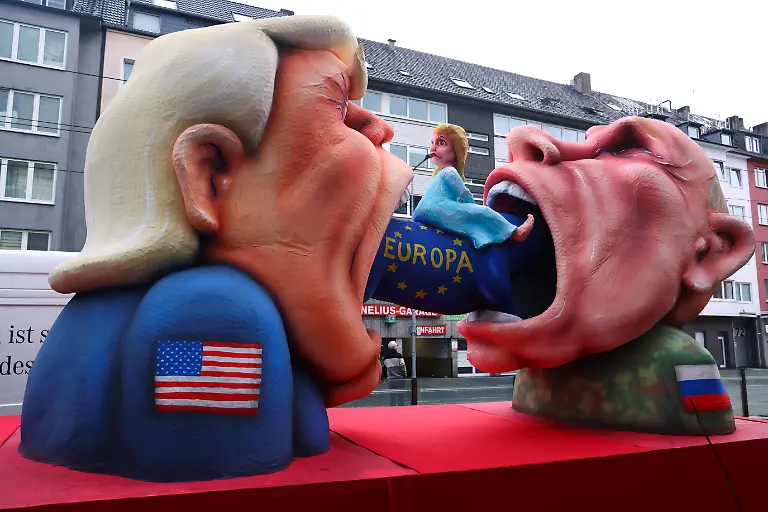 A-carnival-float-depicting-U-S-President-Donald-Trump-and-Russian-President-Vladimir-Putin-stands-at-the-traditional-Rosenmontag-Rose-Monday-carnival-parade-in-Duesseldorf-Germany-February-16-2026