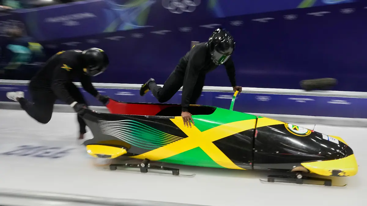 Jamaica-s-Shane-Pitter-right-starts-for-a-two-man-bobsled-training-session-at-the-2026-Winter-Olympics-in-Cortina-d-Ampezzo-Italy-Saturday-Feb-14-2026
