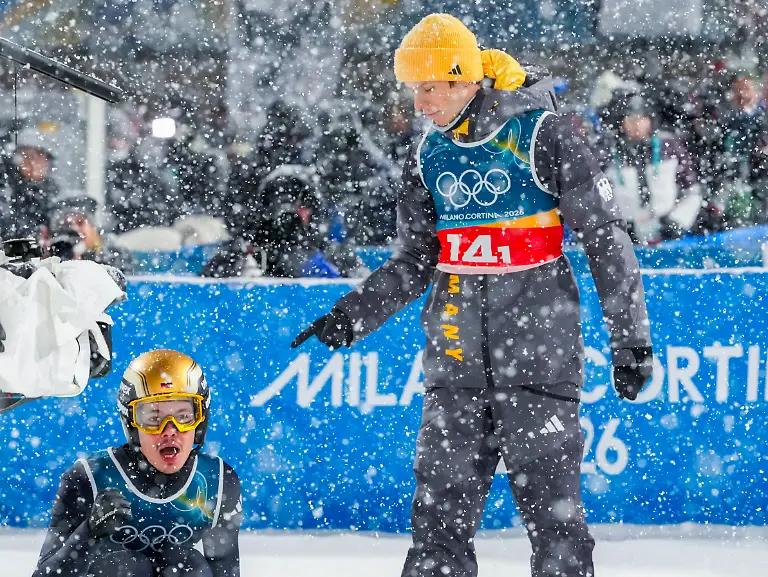 Val-di-Fiemme-Italy-20260216-German-Philipp-Raimund-in-the-final-round-of-the-men-s-Super-Team-Large-Hill-Jump-at-the-Predazzo-Ski-Jumping-Stadium-during-the-Milan-Cortina-2026-Winter-Olympics-Ski-jumpers-Andreas-Wellinger-and-Philipp-Raimund-were-frustrated-after-narrowly-losing-the-bronze-medal-in-Monday-s-chaotic-race-at-the-Olympics
