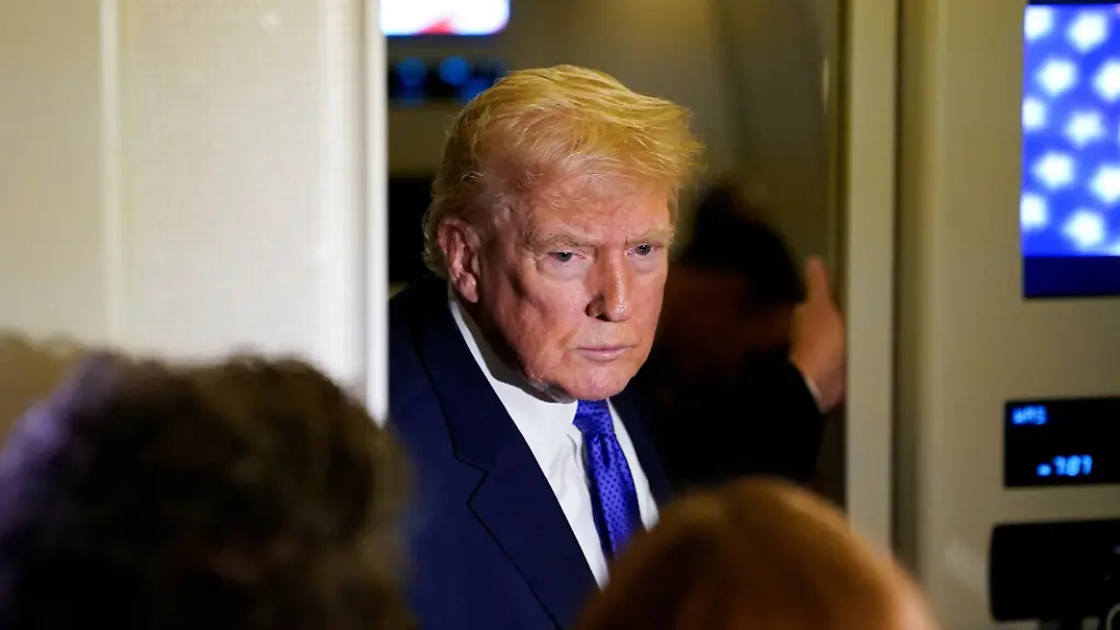 U-S-President-Donald-Trump-speaks-to-reporters-onboard-Air-Force-One-on-travel-from-West-Palm-Beach-Florida-to-Joint-Base-Andrews-Maryland-U-S-February-16-2026