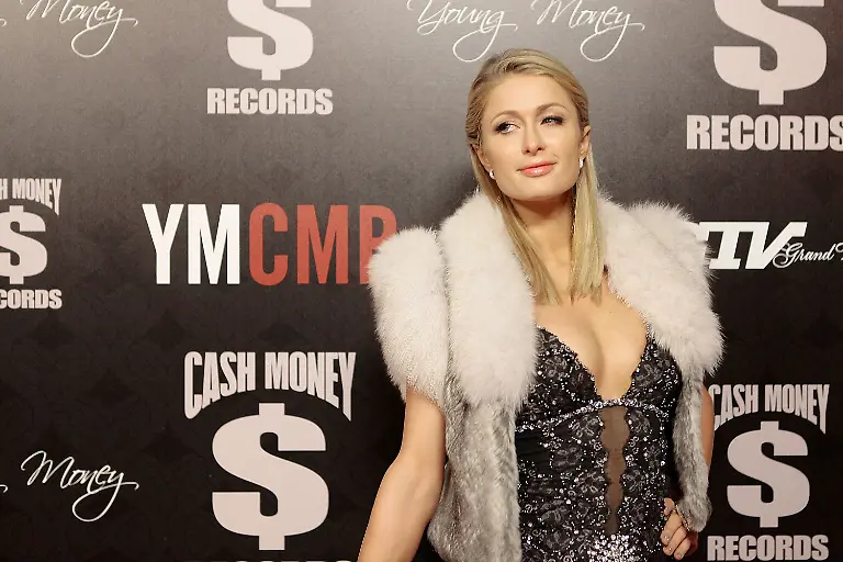 WEST-HOLLYWOOD-CA-FEBRUARY-09-Paris-Hilton-arrives-at-the-Cash-Money-Records-4th-annual-pre-GRAMMY-Awards-party-on-February-9-2013-in-West-Hollywood-California