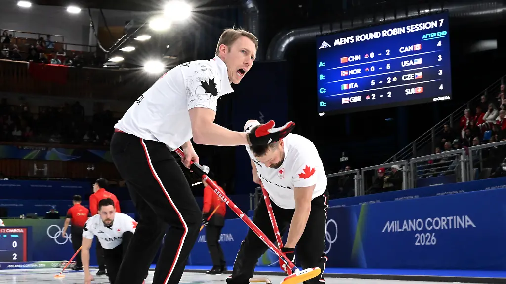260216-CORTINA-D-AMPEZZO-Feb-16-2026-Xinhua-Marc-Kennedy-of-Canada-competes-during-the-curling-men-round-robin-session-7-match-between-China-and-Canada-at-the-2026-Milan-Cortina-Winter-Olympics-in-Cortina-Italy-Feb-15-2026