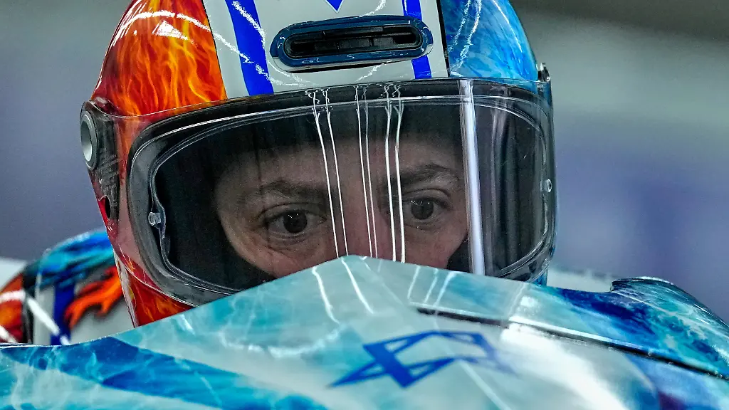 Israel-s-Adam-Edelman-front-and-Menachem-Chen-start-for-a-two-man-bobsled-run-at-the-2026-Winter-Olympics-in-Cortina-d-Ampezzo-Italy-Monday-Feb-16-2026
