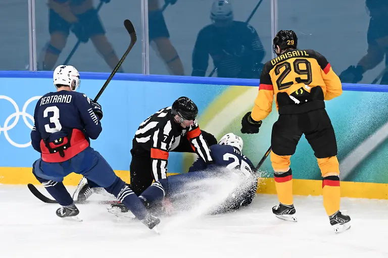 Charles-Bertrand-3-of-Team-France-Nicolas-Ritz-25-of-Team-France-Leon-Draisaitl-29-of-Team-Germany-during-the-men-s-qualification-play-off-ice-hockey-match-between-Germany-and-France-at-the-Milano-Santagiulia-Ice-Hockey-Arena-during-the-Milano-Cortina-2026-Winter-Olympic-Games-in-Milan-on-February-17-2026-Photo-by-JMP-ABACAPRESS