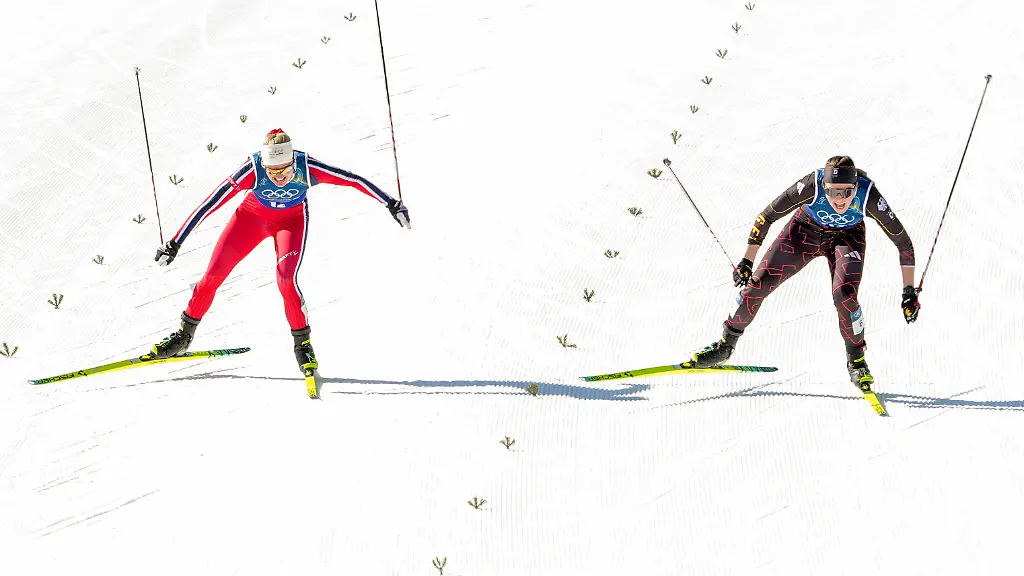 Winter-Olympics-in-Milan-Cortina-2026-Val-di-Fiemme-Italy-20260218-Julie-Bjervig-Drivenes-from-Norway-and-Coletta-Rydzek-from-Germany-during-the-cross-country-team-sprint-on-Lago-di-Tesero-during-the-Winter-Olympics-in-Milano-Cortina-2026-Photo-Lise-Aaserud-NTB-Val-di-Fiemme-Italy-EDITORIAL-USE-ONLY-RESTRICTED-USE-FOR-BETTING-COMPANIES-Ref-SPOdJbtjjq0RNQ