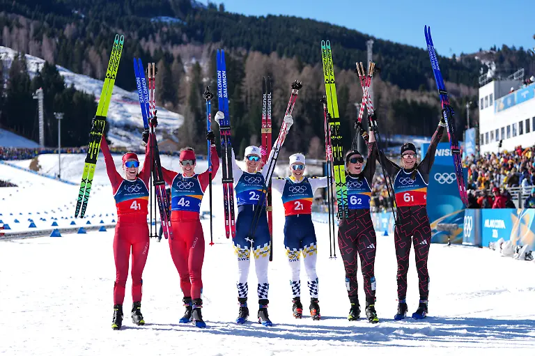 260218-TESERO-Feb-18-2026-Gold-medalists-Jonna-Sundling-and-Maja-Dahlqvist-of-Sweden-silver-medalists-Nadja-Kaelin-and-Nadine-Faehndrich-of-Switzerland-and-bronze-medalists-Laura-Gimmler-and-Coletta-Rydzek-of-Germany-pose-after-the-cross-country-skiing-women-s-team-sprint-free-final-at-the-Milan-Cortina-2026-Olympic-Winter-Games-in-Tesero-Italy-Feb-18-2026