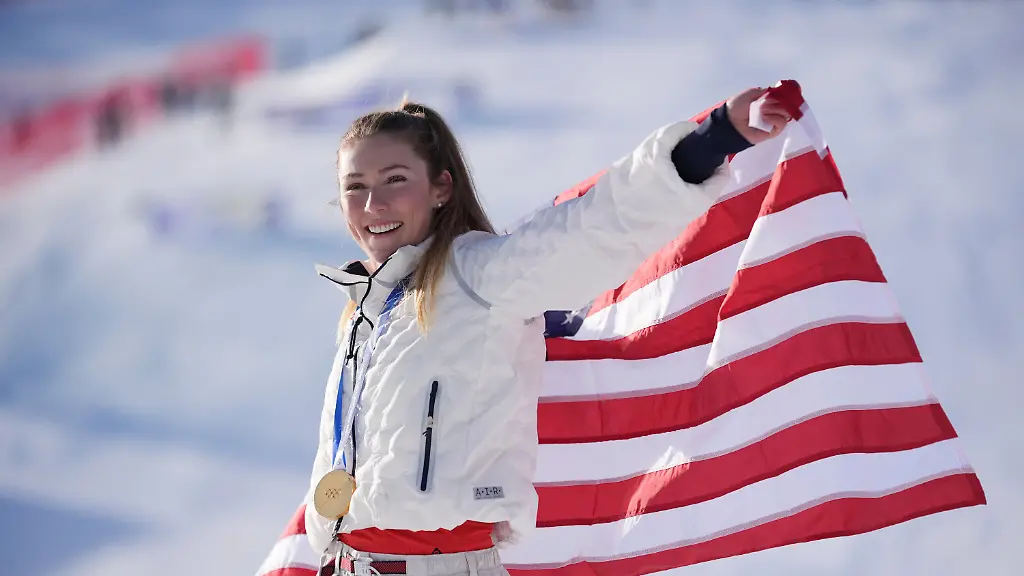 United-States-Mikaela-Shiffrin-celebrates-winning-the-gold-medal-in-an-alpine-ski-women-s-slalom-race-at-the-2026-Winter-Olympics-in-Cortina-d-Ampezzo-Italy-Wednesday-Feb-18-2026