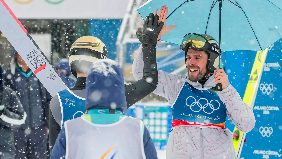 Val-di-Fiemme-Italy-20260219-Vinzenz-Geiger-and-Johannes-Rydzek-from-Germany-during-the-combined-team-sprint-on-the-large-hill-in-the-Predazzo-Ski-Jumping-Stadium-during-the-Winter-Olympics-in-Milano-Cortina-2026