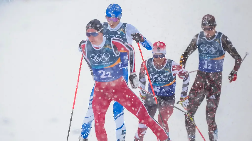 Val-di-Fiemme-Italy-20260219-Jens-Luraas-Oftebro-from-Norway-Eero-Hirvonen-from-Finland-Johannes-Lamparter-from-Austria-and-Vinzenz-Geiger-from-Germany-during-the-combined-team-sprint-2-x-7-5-km-Tesero-CC-Stadium-during-the-Winter-Olympics-in-Milano-Cortina-2026