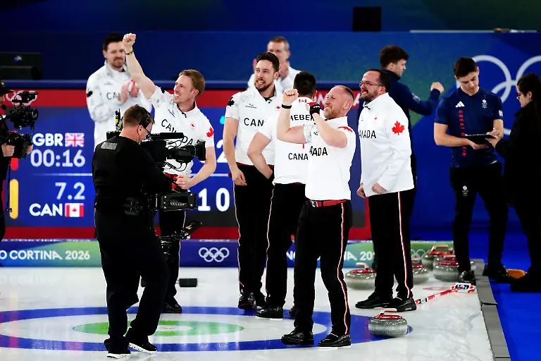 Milano-Cortina-2026-Winter-Olympics-Day-Fifteen-Canada-s-Brad-Jacobs-centre-and-team-mates-celebrate-winning-the-Men-s-Curling-gold-medal-game-against-Great-Britain-at-the-Curling-Stadium-on-day-fourteen-of-the-Milano-Cortina-2026-Winter-Olympics-Italy-Picture-date-Saturday-February-21-2026-Photo-credit-should-read-Andrew-Milligan-PA-Wire-RESTRICTIONS-Use-subject-to-restrictions-Editorial-use-only-no-commercial-use-without-prior-consent-from-rights-holder