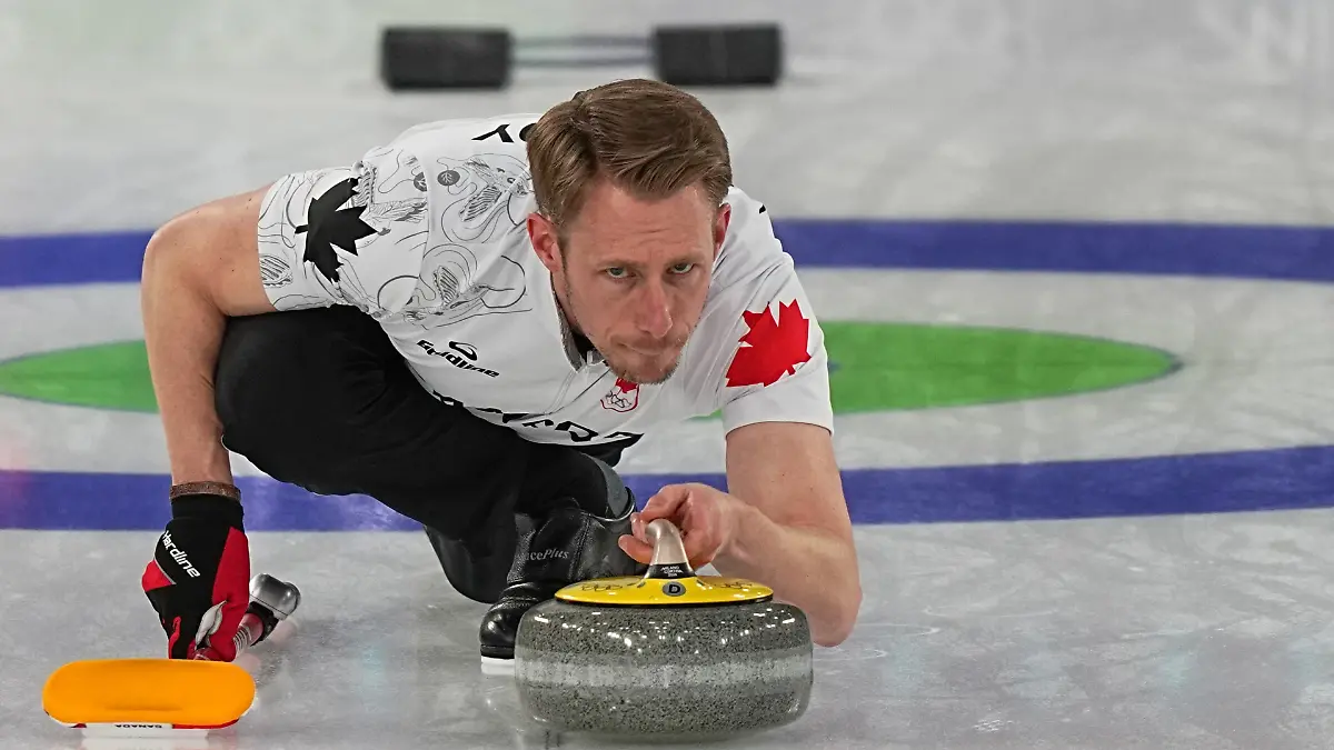 Canada-s-Marc-Kennedy-competes-during-a-men-s-curling-gold-medal-match-between-Britain-and-Canada-at-the-2026-Winter-Olympics-in-Cortina-d-Ampezzo-Italy-Saturday-Feb-21-2026