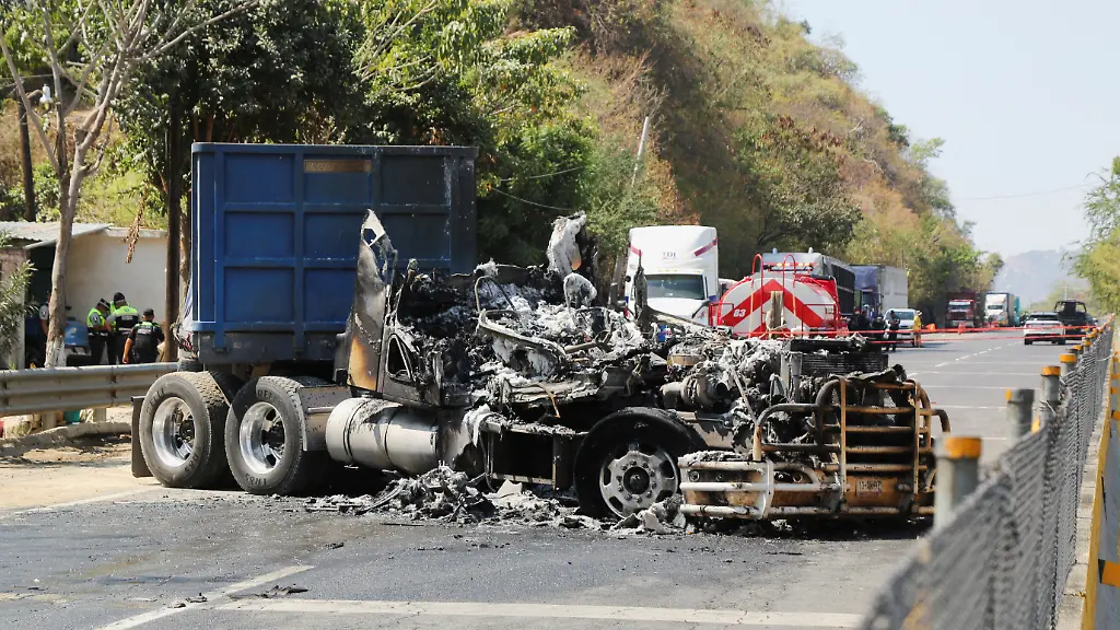 The-wreckage-of-a-trailer-following-roadblocks-and-arson-attacks-carried-out-by-members-of-organized-crime-in-several-states-after-a-military-operation-in-which-a-government-source-said-Mexican-drug-lord-Nemesio-Oseguera-known-as-El-Mencho-was-killed-in-Jalisco-state-in-Acapulco-Mexico-February-22-2026