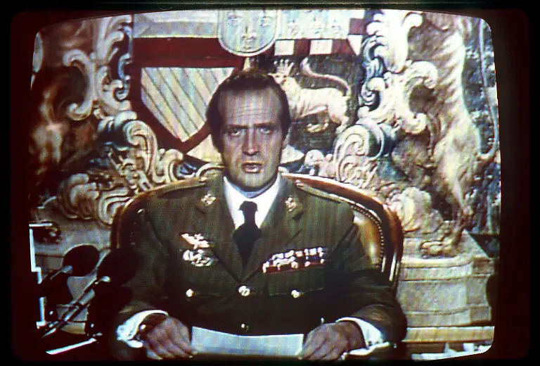 FILE-File-picture-dated-on-23-February-1981-of-a-tv-grab-showing-Spain-s-King-Juan-Carlos-addressing-Spanish-citizens-from-the-Zarzuela-palace-during-the-coup-d-etat-of-colonel-Antonio-Tejero-at-the-Spanish-Lower-House-in-Madrid-central-Spain