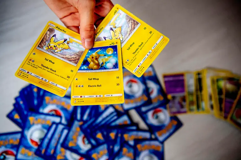 ROTTERDAM-A-girl-with-her-pokemon-card-collection-Pokemon-cards-are-gold-and-very-popular-and-sold-out-everywhere-In-addition-Pokemon-is-25-years-old-this-year-and-special-editions-of-the-cards-are-now-coming-out-A-pack-of-10-cards-normally-costs-around-seven-euros