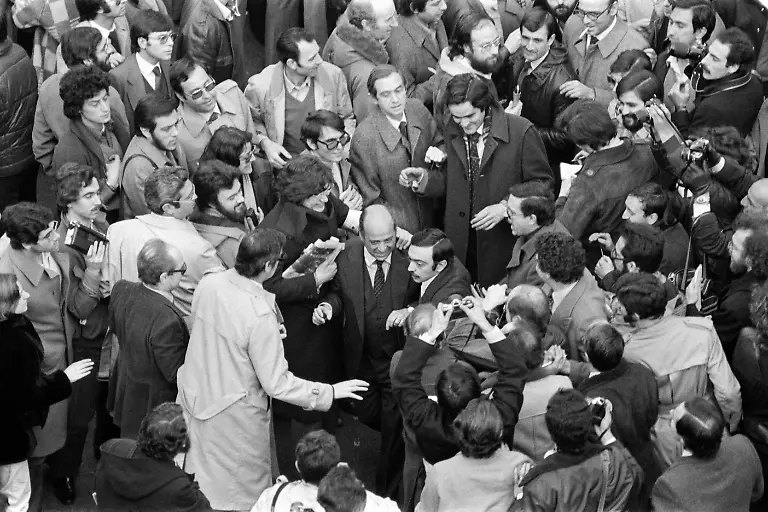 Journalists-and-onlookers-welcome-Parliament-deputies-just-released-after-17-hours-as-hostages-of-rebel-insurgents-outside-the-Parliament-building-in-Madrid-on-February-24-1981-Lieutenant-Colonel-Antonio-Tejero-de-Molina-and-members-of-the-Civil-Guard-took-on-February-23-1981-the-cabinet-and-some-350-MPs-hostage-during-an-attempted-coup-by-a-right-wing-group-of-the-paramilitary-Guardia-Civil
