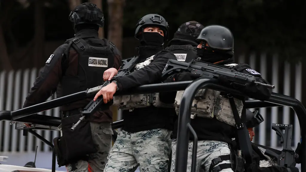 MEXICO-CITY-MEXICO-FEBRUARY-22-Members-of-the-National-Guard-stand-guard-outside-the-facilities-of-the-Specialized-Prosecutor-s-Office-for-Organized-Crime-FEMDO-in-Mexico-City-Mexico-on-February-22-2026-The-security-presence-outside-the-FEMDO-facilities-follows-an-operation-earlier-in-the-day-in-which-cartel-leader-Nemesio-Oseguera-Cervantes-known-as-El-Mencho-was-killed-during-a-military-operation-in-Tapalpa-in-the-state-of-Jalisco-authorities-confirmed