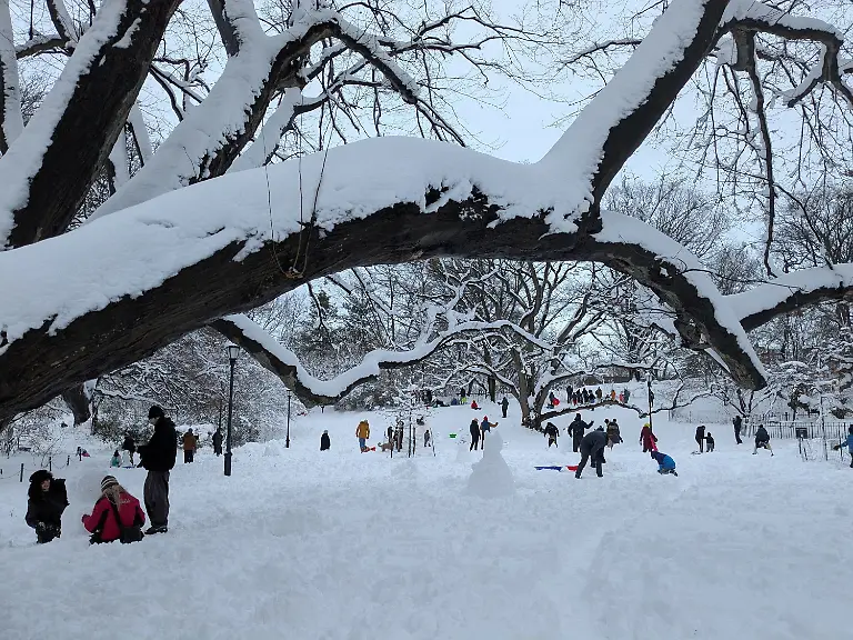 Families-play-in-the-snow-in-Prospect-Park-in-Brooklyn-borough-of-New-York-on-Monday-Feb-23-2026