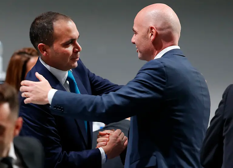 Newly-elected-FIFA-President-Gianni-Infantino-of-Switzerland-is-congratulated-by-fellow-candidate-Prince-Ali-Al-Hussein-of-Jordan-left-after-the-second-election-round-during-the-extraordinary-FIFA-congress-in-Zurich-Switzerland-Friday-Feb-26-2016
