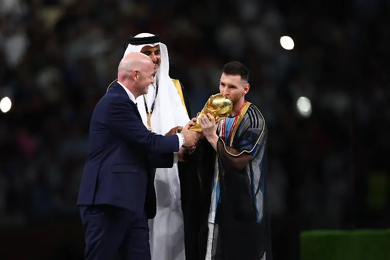 LUSAIL-CITY-QATAR-DECEMBER-18-Lionel-Messi-of-Argentina-and-Gianni-Infantino-FIFA-President-and-Tamim-bin-Hamad-Al-Than-President-of-Qatar-seen-during-the-FIFA-World-Cup-Qatar-2022-Final-match-between-Argentina-and-France-at-Lusail-Stadium-on-December-18-2022-in-Lusail-City-Qatar-Photo-by-Amin-Jamali-ATP-Images-ARGENTINA-vs-FRANCE-FINAL-FIFA-FOOTBALL-WORLD-CUP-2022-in-the-Lusail-Stadium-Football-FIFA-World-Cup-2022-in-Qatar-22-Fussball-Welt-Cup-DOHA-Katar-LUSAIL-Stadion-copyright-Amin-JAMALI-ATP-images-Local-Caption-LUSAIL-CITY-QATAR-DECEMBER-18-Lionel-Messi-of-Argentina-and-Gianni-Infantino-FIFA-President-and-Tamim-bin-Hamad-Al-Than-President-of-Qatar-seen-during-the-FIFA-World-Cup-Qatar-2022-Final-match-between-Argentina-and-France-at-Lusail-Stadium-on-December-18-2022-in-Lusail-City-Qatar