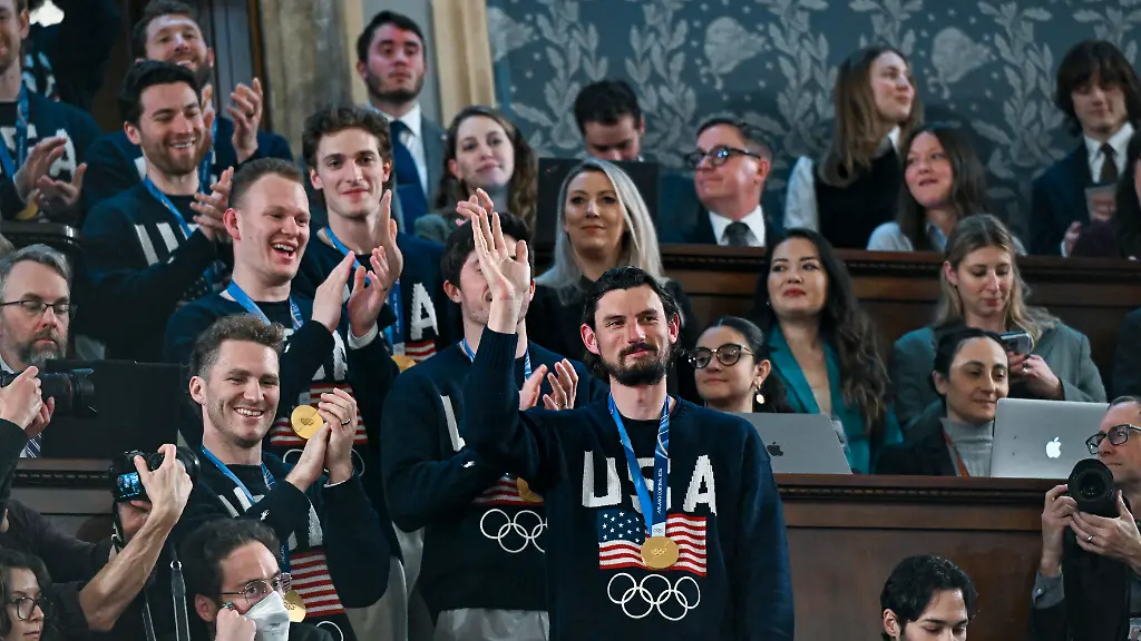 The-United-States-Olympic-Menas-Ice-Hockey-Team-Connor-Hellebuyck-in-front-as-President-Donald-J-Trump-delivers-the-first-State-of-the-Union-address-of-his-second-term-to-a-joint-session-of-Congress-in-the-House-Chamber-of-the-United-States-Capitol-in-Washington-D-C-on-Tuesday-February-24-2026-Photo-by-Kenny-Holston-Pool-via-CNP-ABACAPRESS