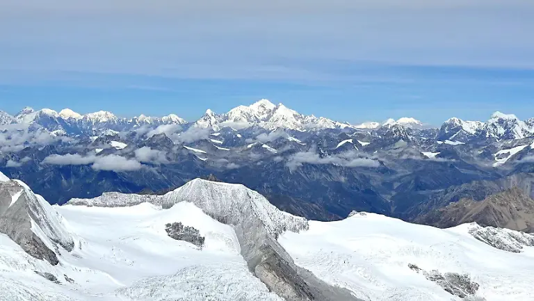 SHIGATSE-CHINA-OCTOBER-1-2023-View-of-Cho-Oyu-the-world-s-sixth-highest-peak-at-1-19-PM-October-1-2023-Shigatse-City-Tibet-China-At-8-201-meters-above-sea-level-Cho-Oyu-is-the-sixth-highest-mountain-in-the-world-On-the-same-day-18-Chinese-scientific-team-members-also-successfully-reached-the-summit-of-Cho-Oyu-carrying-out-a-number-of-scientific-missions-such-as-setting-up-an-automatic-weather-station-at-extremely-high-altitude-measuring-the-thickness-of-snow-and-ice-on-the-summit-drilling-ice-cores-and-collecting-snow-and-ice-samples-At-8-o-clock-on-May-11-2021-Maxiao-successfully-stood-on-the-top-of-Mount-Everest-the-world-s-highest-mountain-at-an-altitude-of-8-848-86-meters
